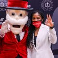 Brittany Young poses with an APSU mascot during her introductory press conference. ERIC ELLIOT | APSU ATHLETICS